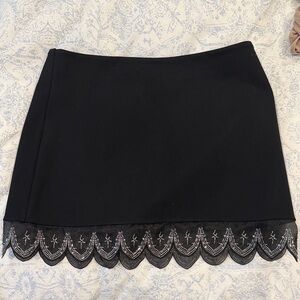 STAUD Black Mini Skirt with Embroidered Hem